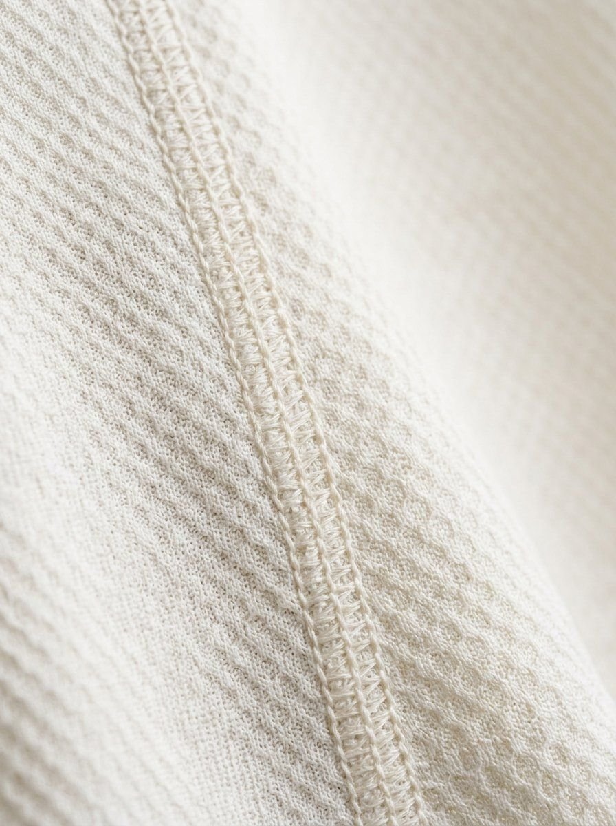 Breathable cricket pique athletic poly fabric with reinforced stitching